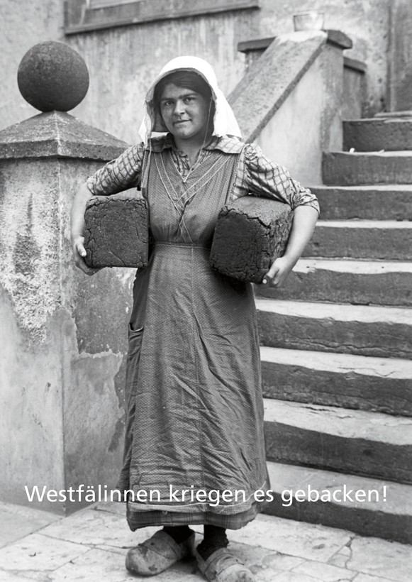 Junge Westfälin mit Pumpernickelbroten, ca. 1919 Fotograf: Heinrich Genau/LWL-Medienzentrum für Westfalen